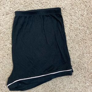 Black shortie pj bottoms W/ pale pink satin trim. NWOT fits like a L. Cool blend